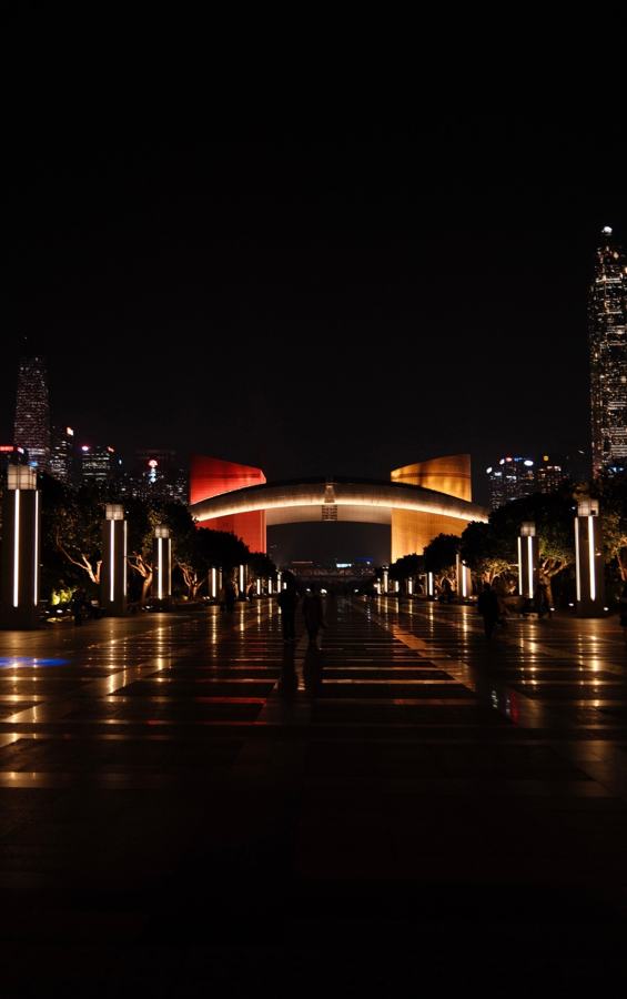 Waterfront promenade lit up at night