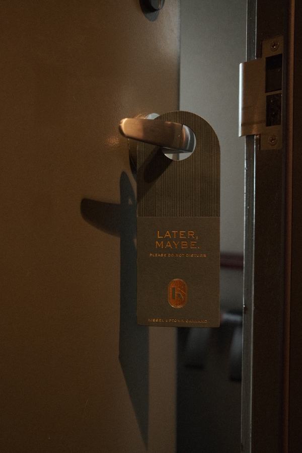 Door hanger on a hotel room door handle