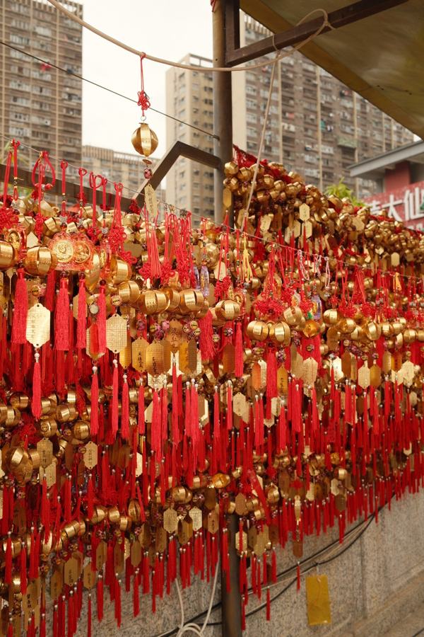 Red wishing ribbons hung on a wall